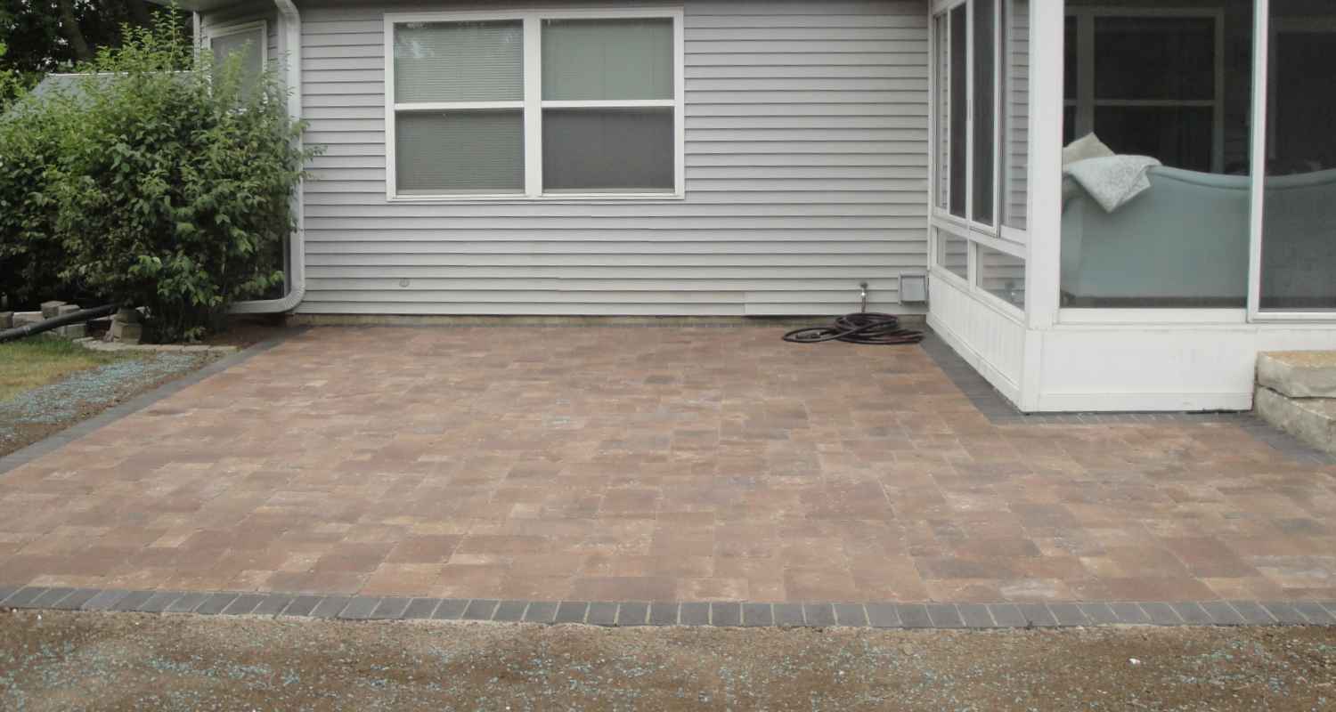 View of finished patio and fireplace.
