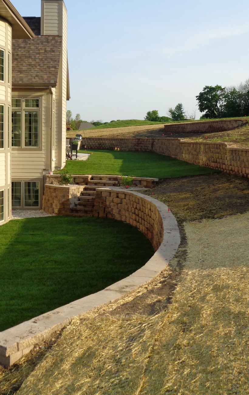 View of finished patio and fireplace.