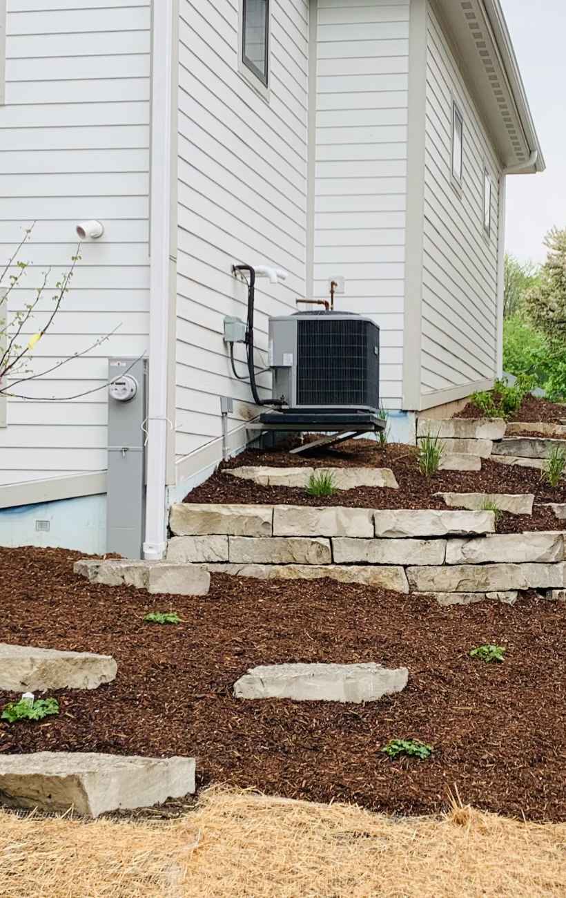 View of finished patio and fireplace.